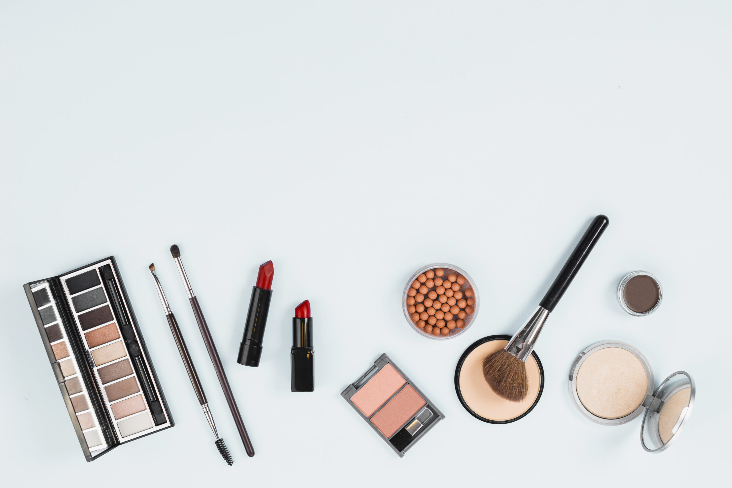 Aesthetic flat-lay of trending K-beauty makeup products and cosmetics on a clean background for ASSA Korea